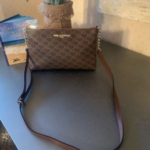 Karl Langerfeld, crossbody bag. Brown K L signature. 4 inches of chain on strap.